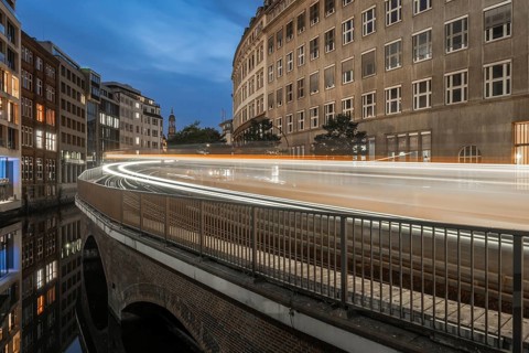 Long exposure at Mönkedamm with underground line U3 and light strip and St Michael's Church in the