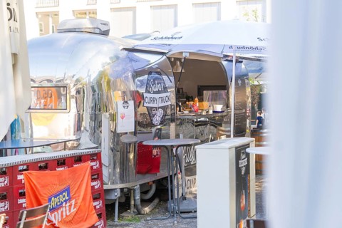 Shiny chrome-look curry snack van with drinks, in an urban environment, Sindelfingen, Böblingen