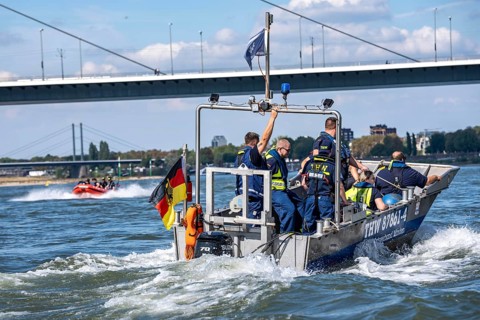 Multi-purpose boat of the THW during a training trip on the Rhine near Düsseldorf, the specialist