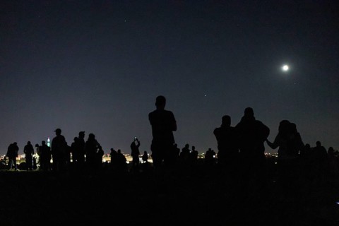 Visitors photograph the lunar eclipse from Drachenberg on 07/09/2025