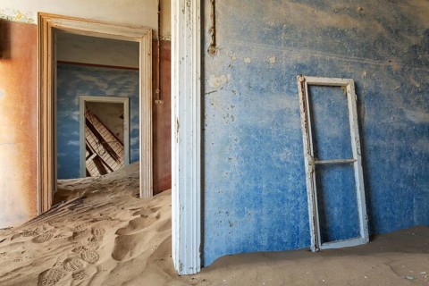 At Kolmanskop, the abandoned ghost town of the diamond days of the early 1900 and of German origin.