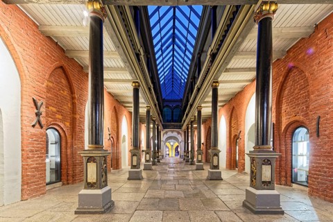 Night view, north-south passageway with columns and arcade gallery, two storeys, town hall