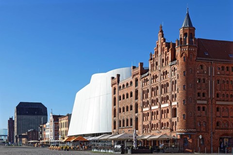 Front right, towered warehouse built in 1905 and warehouse II built in 1888, brick building, in