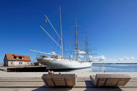 Woman with sun hat on a lounger, Gorch Fock, also Gorch Fock I, built in 1933 by Blohm & Voss for