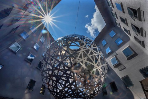 Steel sphere, Sphere, a work of art by Ólafur Eliasson, Fünf Höfe shopping arcade, Munich, Bavaria,