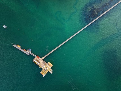 Top Down over Warsash Maritime Academy Pier and River Hamble from drone, Hamble-le-Rice, Warsash,