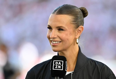 DAZN presenter Laura Wontorra, smiling in interview microphone microphone logo portrait,