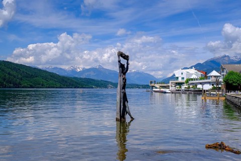 Statue of St Domitian by Giorgio Igne in Lake Millstatt, Millstadt, Carinthia, Austria