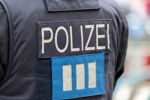 Symbolic image police operation: close-up of a police officer on duty