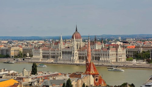 Panoramic view of the hungarian parliament building on the danube river in budapest, hungary,