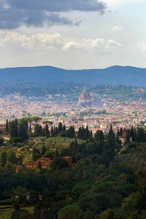 Panoramic view of the city of Florence with dome amidst Tuscan hills in Italy