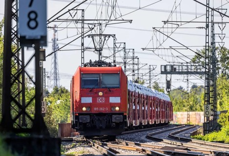 Car train with new cars on the railway line near Stuttgart. The so-called Schusterbahn is a bypass