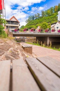 Small town bridge decorated with summer flowers in an urban setting, small town pearl Calw, Black