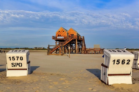 Pile dwelling, toilet house on the beach, beach chairs, Sankt Peter-Ording, Eiderstedt peninsula,