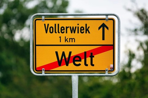 Town sign, traffic sign at the end of the village, end of the village world, inscription, village