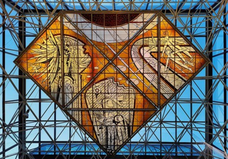 Stained glass artwork entitled Icarus, one of two glass artworks by Leifur Breidfjörd at Keflavik