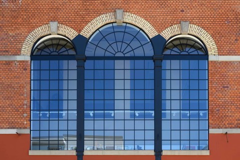 Former factory windows of a brewery boiler house, today artist Stefan Schrumbel's studio,