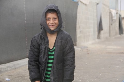Syrian children playing in a refugee camp near the Turkish border on World Children's Day. Aleppo,
