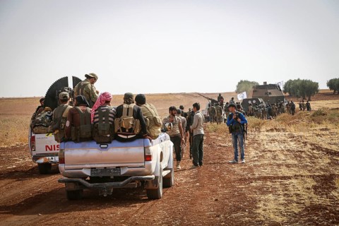 Vehicles and heavy weapons used by Syrian opposition fighters in combat against ISIS. Aleppo, Syria