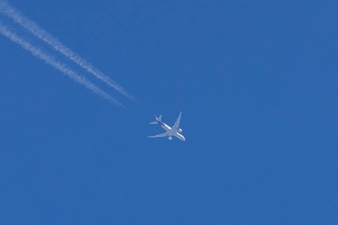 Airbus A300-600RF jet aircraft of FedEx Express airlines in flight with vapour trails or contrails