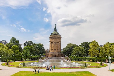 City view, historic water tower with fountain, landmark of Mannheim, Baden-Württemberg, Germany