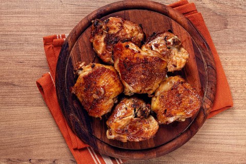 Fried chicken thighs, with spices, homemade, no people