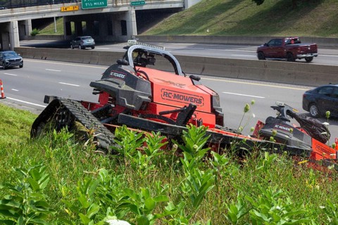 Harper Woods, Michigan, Remote-control mowers are cutting the grass and weeds along Interstate 94