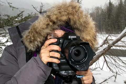 Photographer Veronique Amiard photographs the Ste Anne River in winter, Gaspesie national park,
