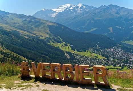 Lettering 'Verbier' in large wooden letters at a photo spot on the Col de la Croix de Cœur pass,