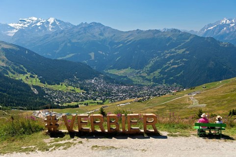 View from the Col de la Croix de Cœur pass to the village of Verbier and the glaciated mountain