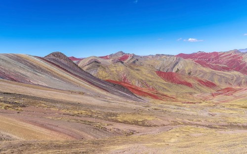 Rainbow mountain Palcoyo, colourful mountains in the background, Checacupe district, Cusco, Peru