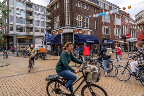 Cycling in the city centre of Groningen, old town, Netherlands