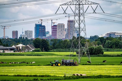 The skyline of the business district in the south-east of Amsterdam, office tower blocks, green