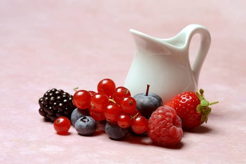 Various fruits with jug, redcurrant, raspberry, strawberry, blueberry, blackberry