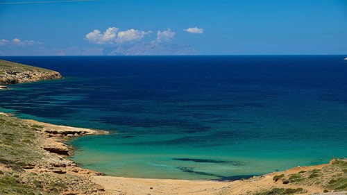 Bay of Vai, Secluded beach with turquoise blue water and rocky coastline, Analipsi, Maltezana,