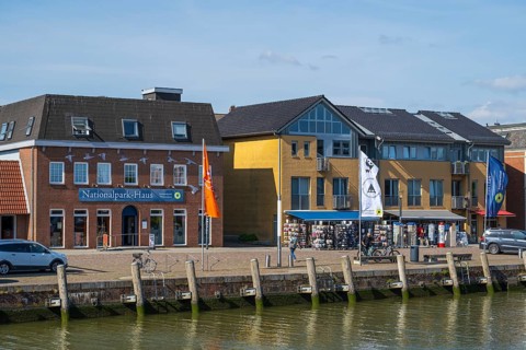 National Park House and other buildings at the harbour, Husum, North Frisia, North Sea,