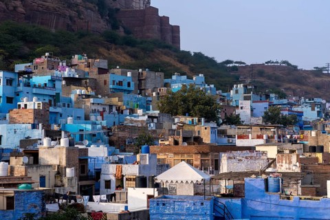 Mehrangarh Fort, above colourful houses, Blue City, Gulab Sagar, Jodhpur, Rajasthan, India