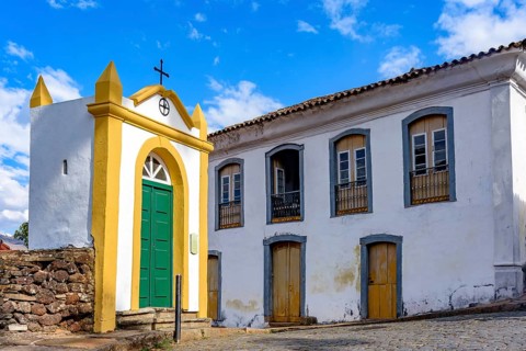 Small chapel and historic mansion on the streets of the city of Ouro Preto in, Ouro Preto, Minas