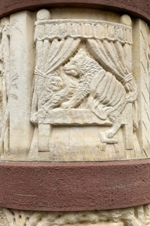 Stone relief half relief motif on fairy tale fountain from fairy tale Little Red Riding Hood and