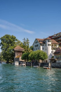 The banks of the Rhine in Diessenhofen with the historic wooden Hänkiturm tower, Canton Thurgau,