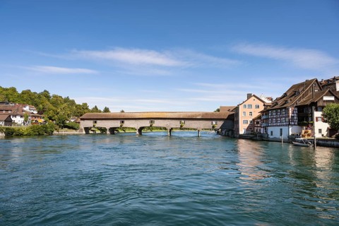 The historic wooden bridge over the Rhine was opened in 1816 and connects the German municipality
