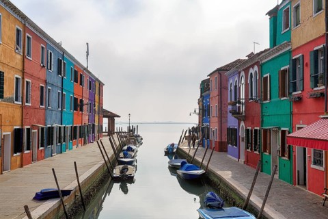 Boats on the canal, typical street scene in winter, colourful facades, various fishermen's houses
