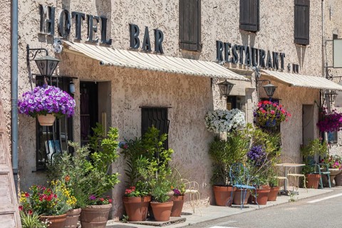 Hotel facade in Aurel, Département Vaucluse, Region Provence-Alpes-Côte d'Azur, South of France,