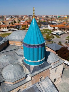 Close-up of a blue dome with elaborate mosaics in the centre of the city, aerial view, Mevlânâ