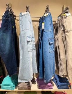 Jeans display at Zudio store in Guwahati, India, during a monsoon season sale on August 1, 2025