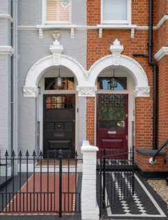 Victorian entrances, black and burgundy doors, black and white tile pattern, Kensington, London,