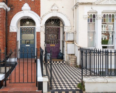 Victorian entrances, blue and purple doors, black and white tile pattern, Kensington, London,