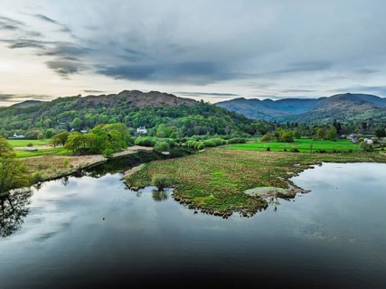 Sunset over Windermere Lake from a drone, Ambleside, Lake District, Cumbria, England, United