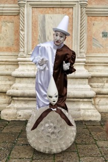 Pierrot, white painted face, conical hat, white clown, figure of the Commedia dell'arte,
