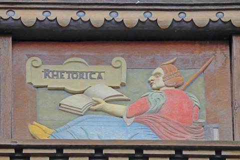 Allegorical woodcarving with figure on rhetoric, speaking, book, Renaissance, allegory, symbol,